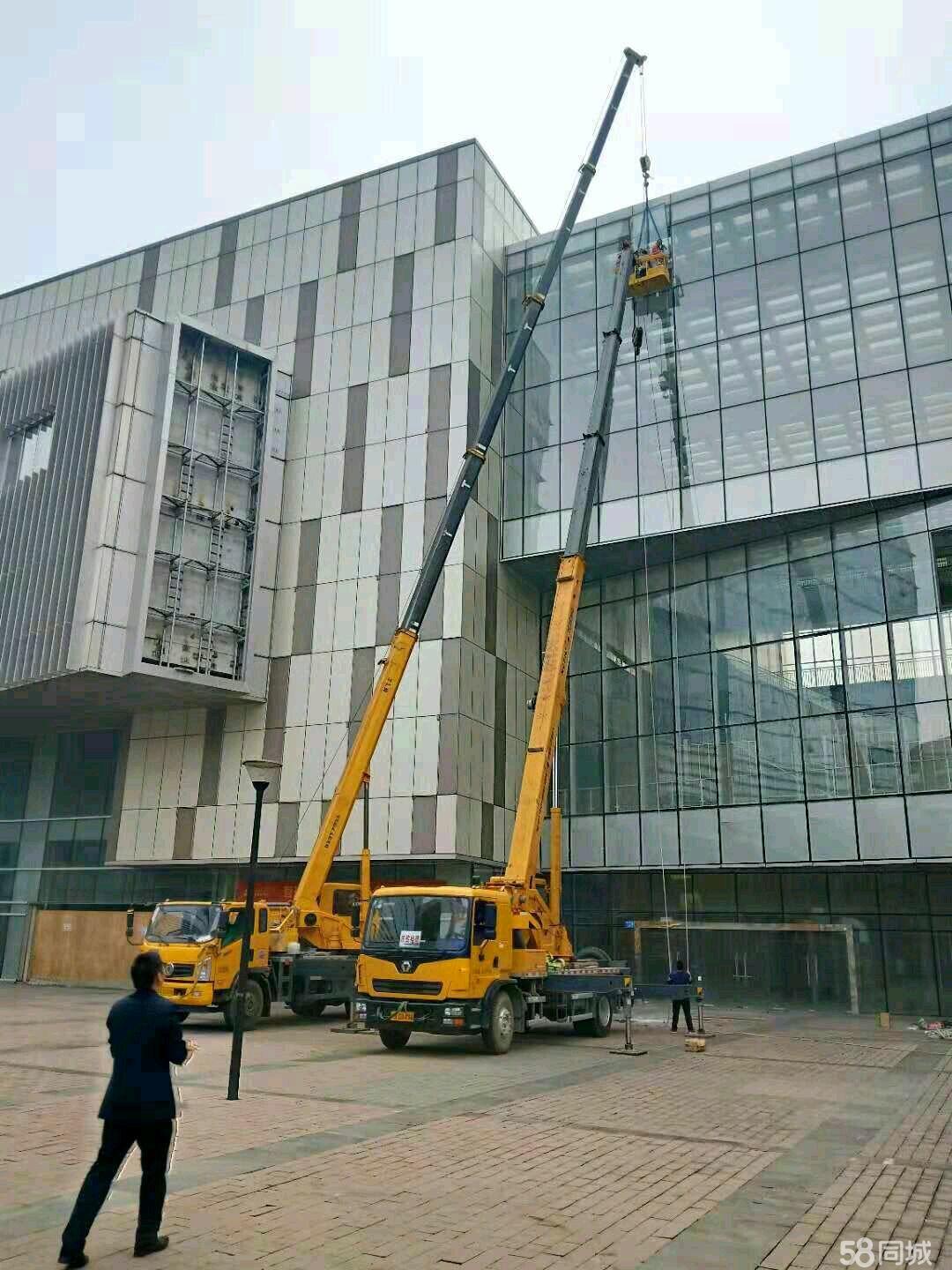 番禺区外墙安装玻璃安全快捷,已顺利完工,专业高空吊车,吊篮车出租